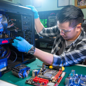 The technician repairing the computer. the concept of computer, CPU, motherboard, hardware, repairing, upgrade and technology.