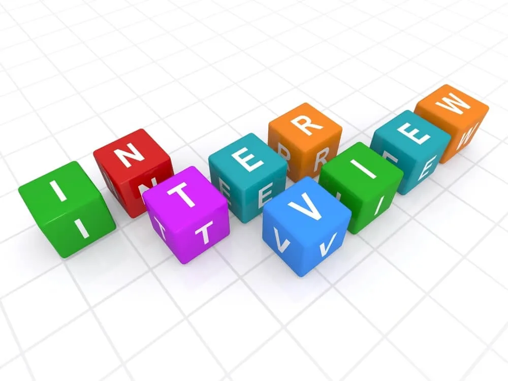Coloured letter blocks spelling the word interview