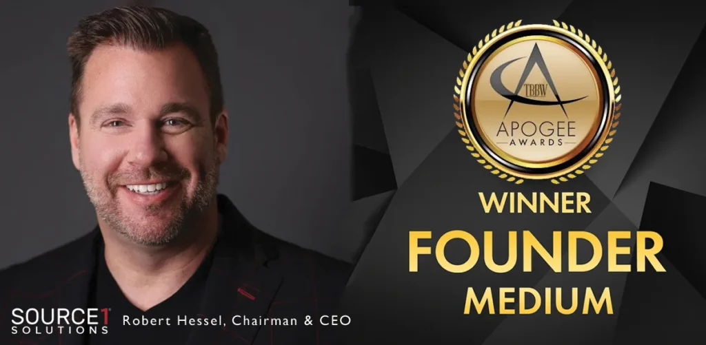 Robert Hessel beside the Apogee Awards Founder of the Year winner badge